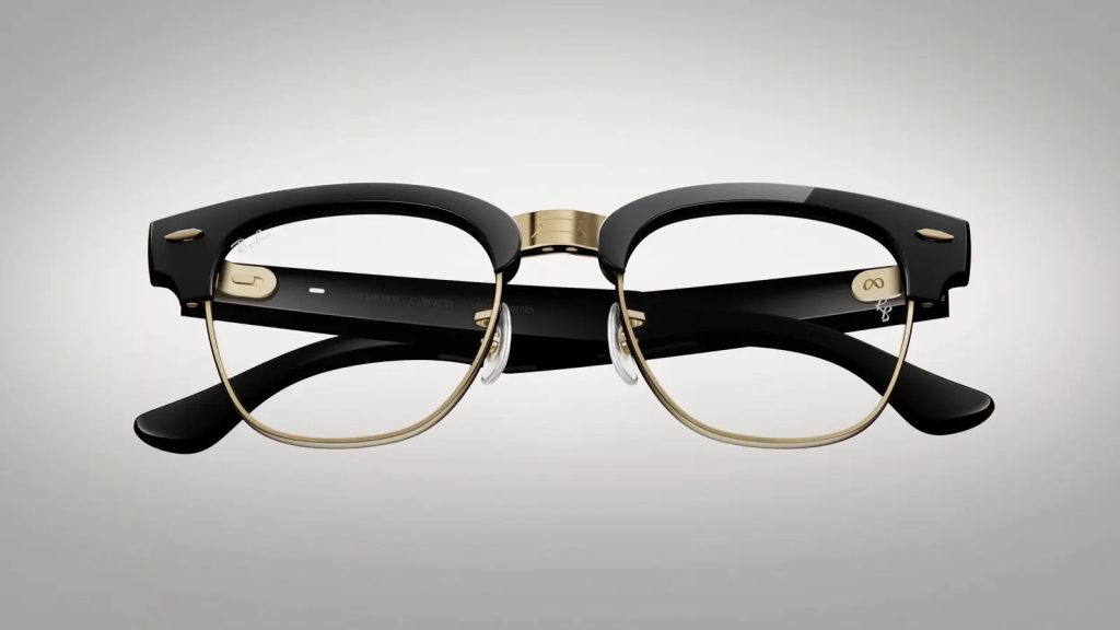 Ray-Ban Meta Audio Clubmaster glasses in black with gold rims, folded