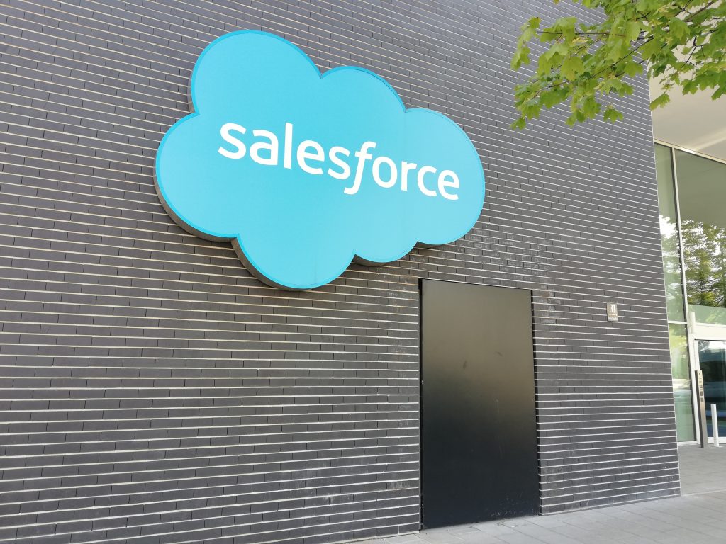 The Salesforce logo mounted on its Munich office building — Salesforce has agreed to acquire AI customer-research startup Listen Labs in a deal reported at about $2 billion.